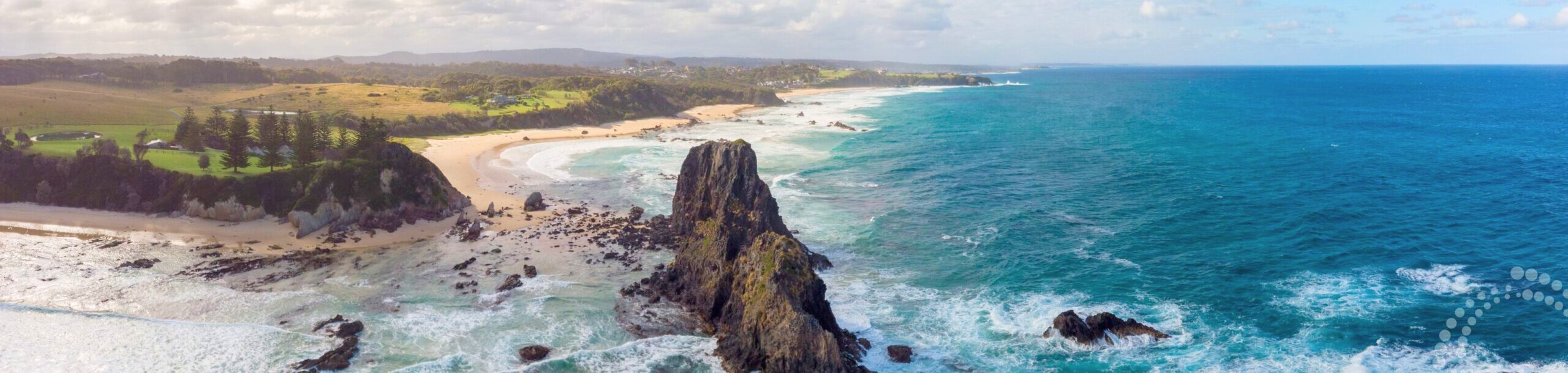 Glasshouse Rocks Narooma with Gulaga in the background.